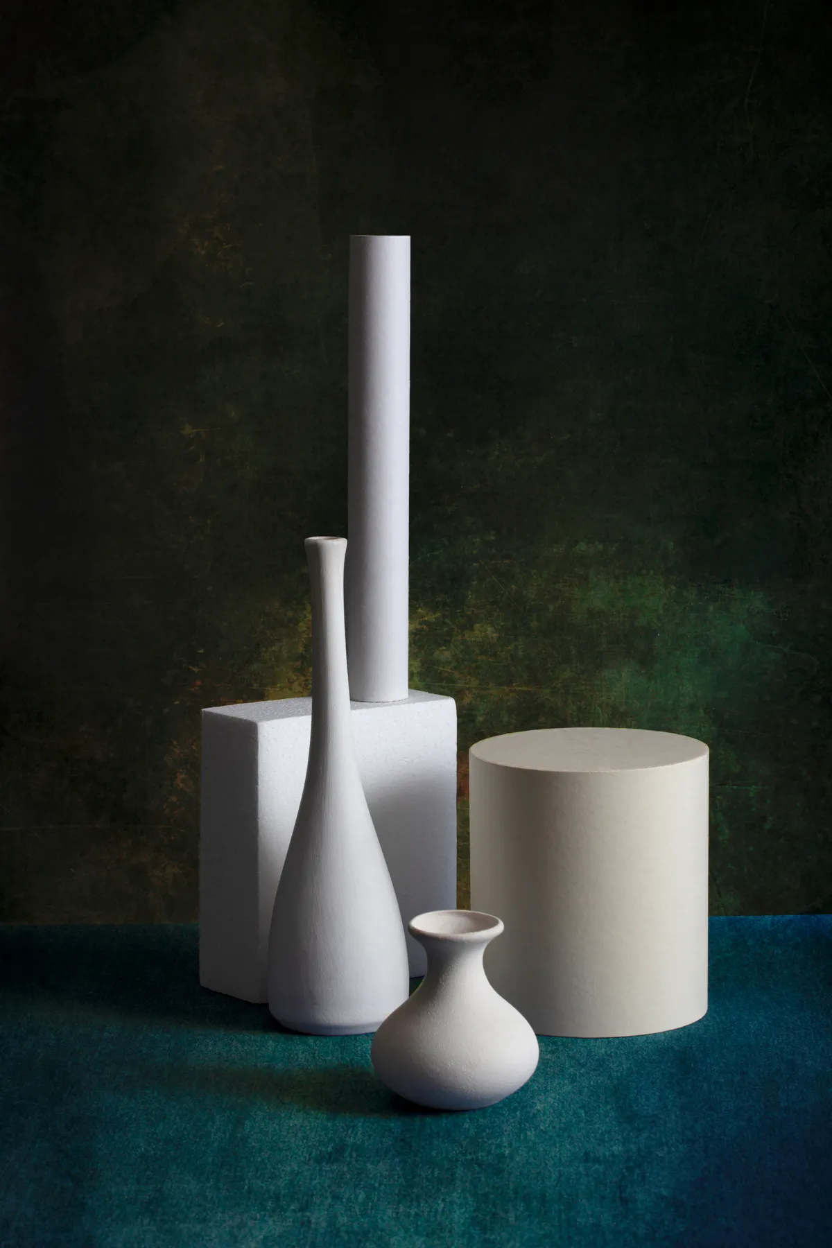 Sculptural white vases presented like a premium design campaign